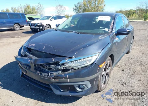 2017 Honda Civic Touring from USA, damaged, VIN 2HGFC1F9XHH642408